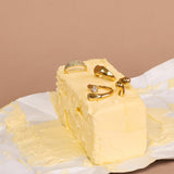 New Champagne Collection jewellery isplayed in a stick of butter