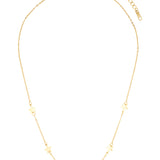 Gold necklace with small star-shaped pendants on a white background