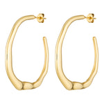 Gold hoop earrings on a white background