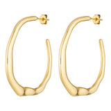 Gold hoop earrings on a white background