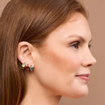 Three different coloured small crystal huggies in gold 