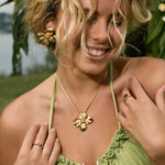 Model in summer jewellery | large flower earrings and necklace 