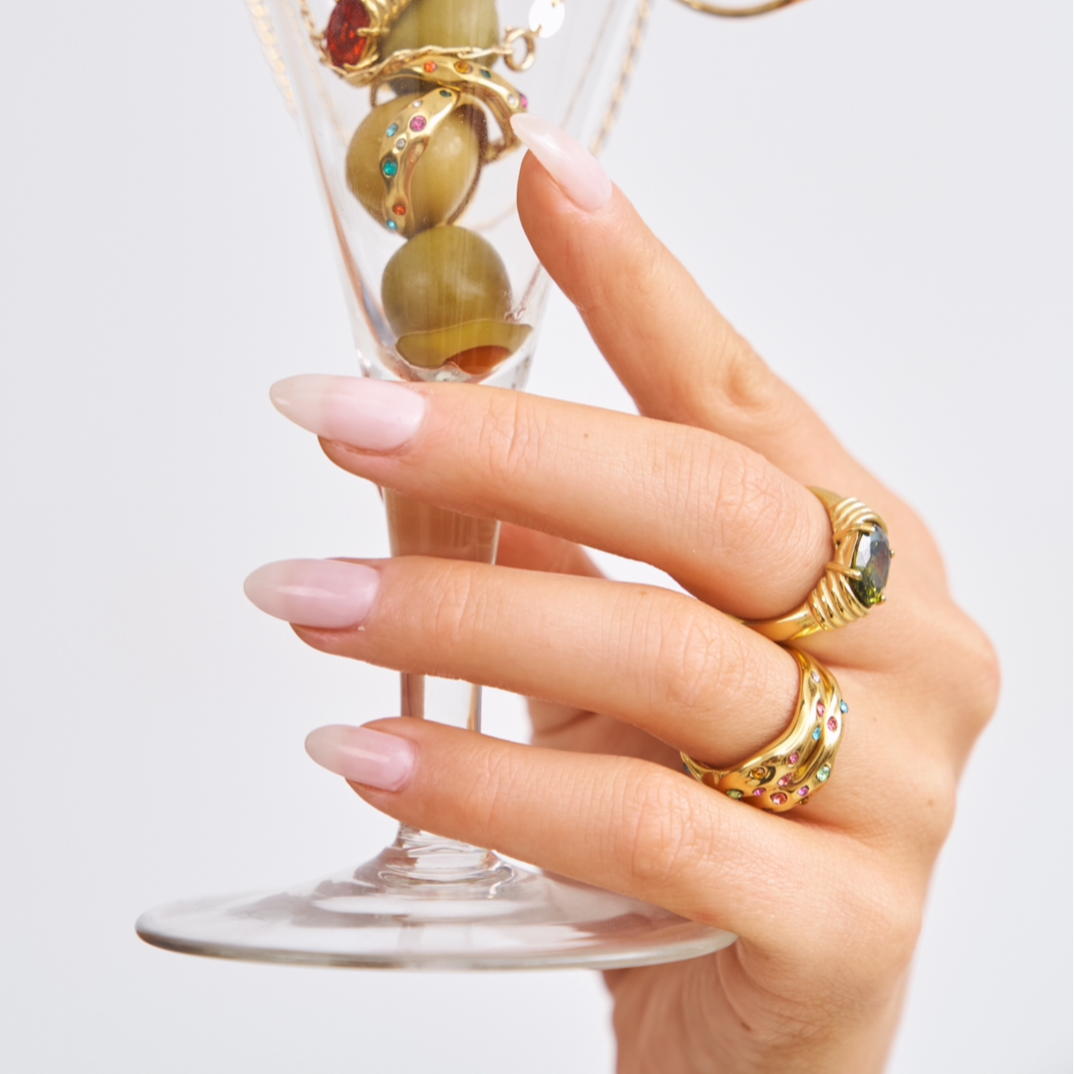 The green peridot coloured glass ring 