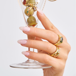 The green peridot coloured glass ring 