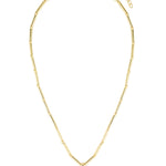 Gold necklace with a heart-shaped pendant on a white background