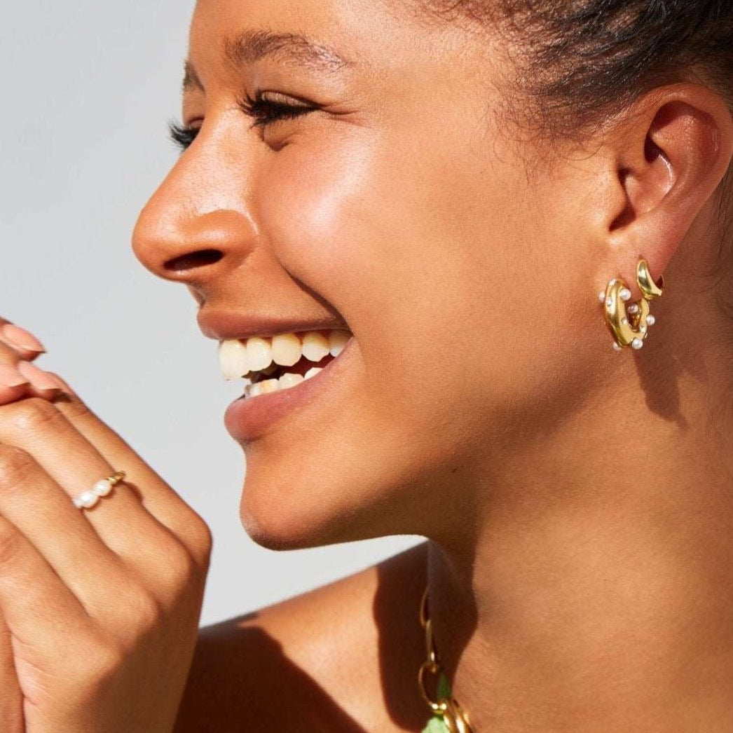 Model in Akoya pearl hoop earrings 