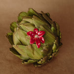 Rhubarb red tropical flower earring styled in an artichoke 