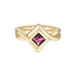 Gold ring with a pink gemstone on a white background