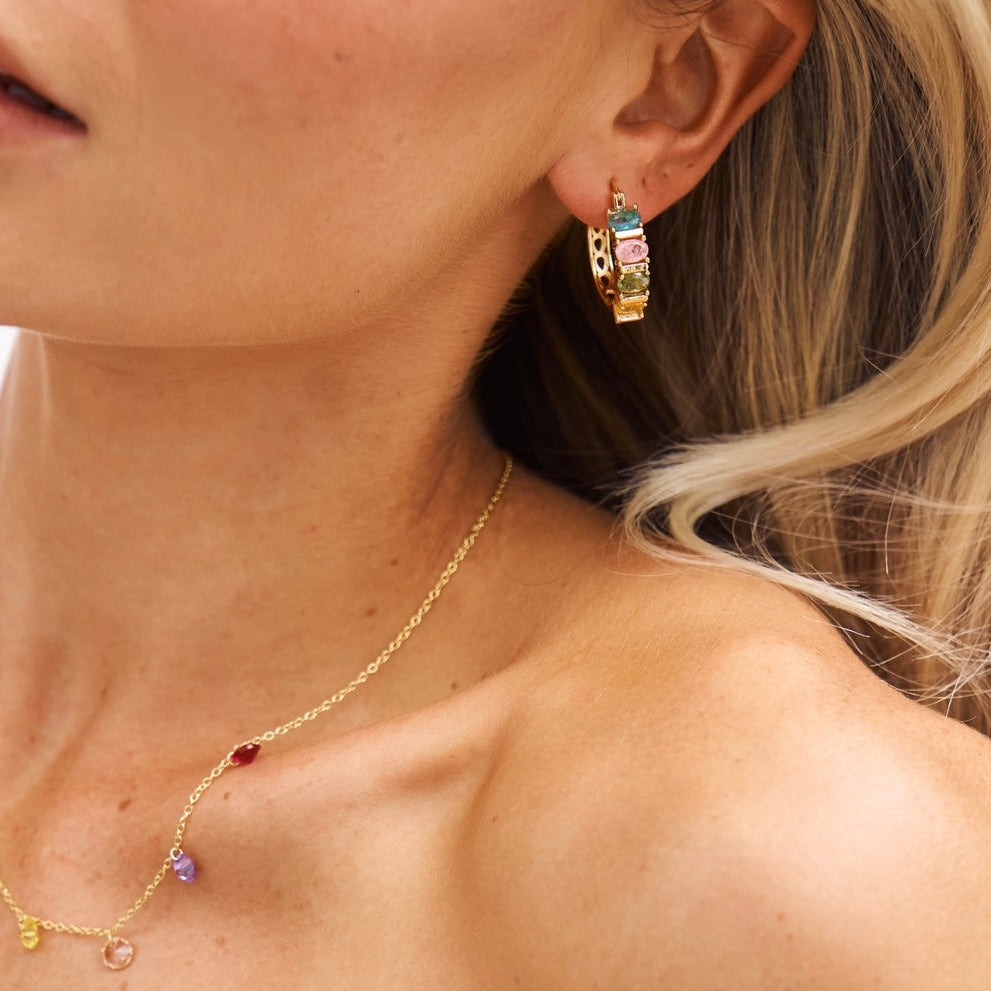 Model in Positano Hoops made of 18k Gold fill and coloured gemstones