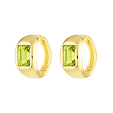 Gold hoop earrings with green gemstones on a white background