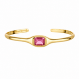 A gold open cuff ring featuring a central square-cut pink gemstone, shown on a plain white background.