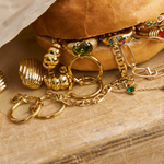 Bixby jewellery staged in a hamburger bun photoshoot