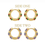 Two pairs of gold huggie hoop earrings with multicolor gemstone accents, labeled 'SIDE ONE' and 'SIDE TWO' on a white background. The top pair features green and red stones, and the bottom pair features purple and blue stones.