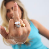 Model showing silver Fuck off ring on her middle finger 