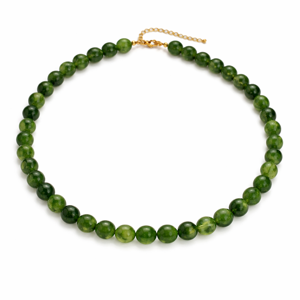 Green beaded necklace on a white background