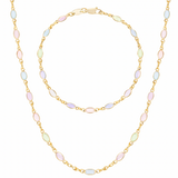 Gold necklace with multicolored beads on a white background