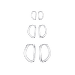 Set of silver hoop earrings on a white background