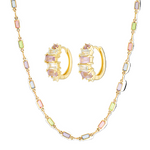 Jewelry set with hoop earrings and a chain necklace featuring multicolored gemstones on a white background.