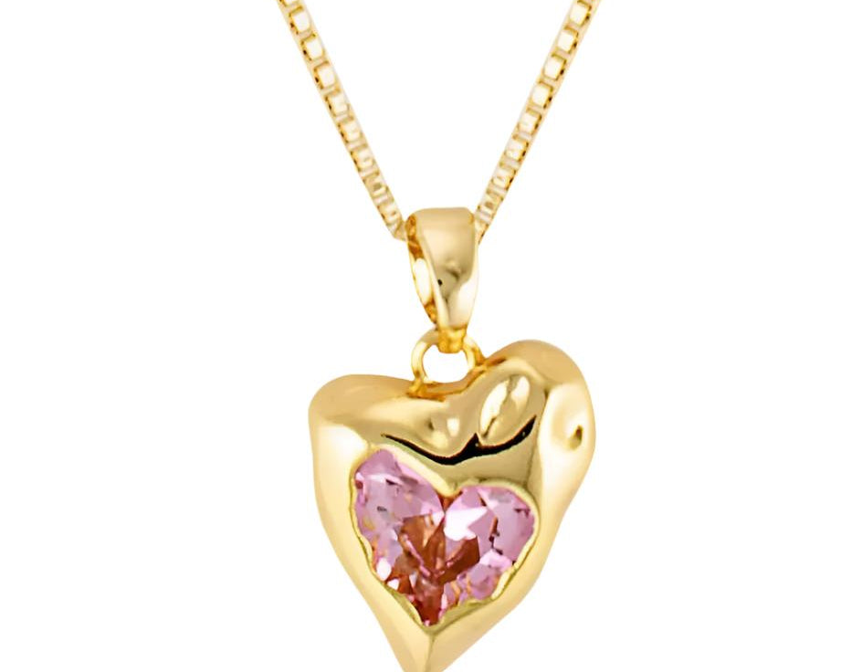 Close up of pink pendant gemstone heart detail 