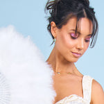 Light green sparkly gold gemstone hoops on Marie Antoinette inspired model 