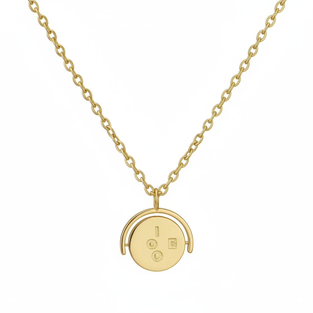 Gold necklace with a round pendant on a white background