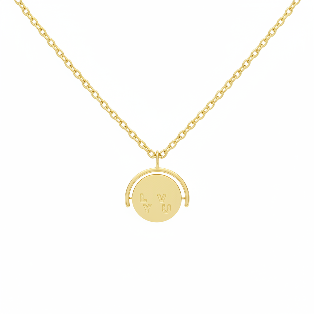 Gold necklace with a round pendant on a white background