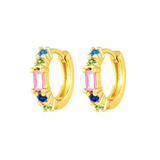 Gold hoop earrings with colorful gemstones on a white background