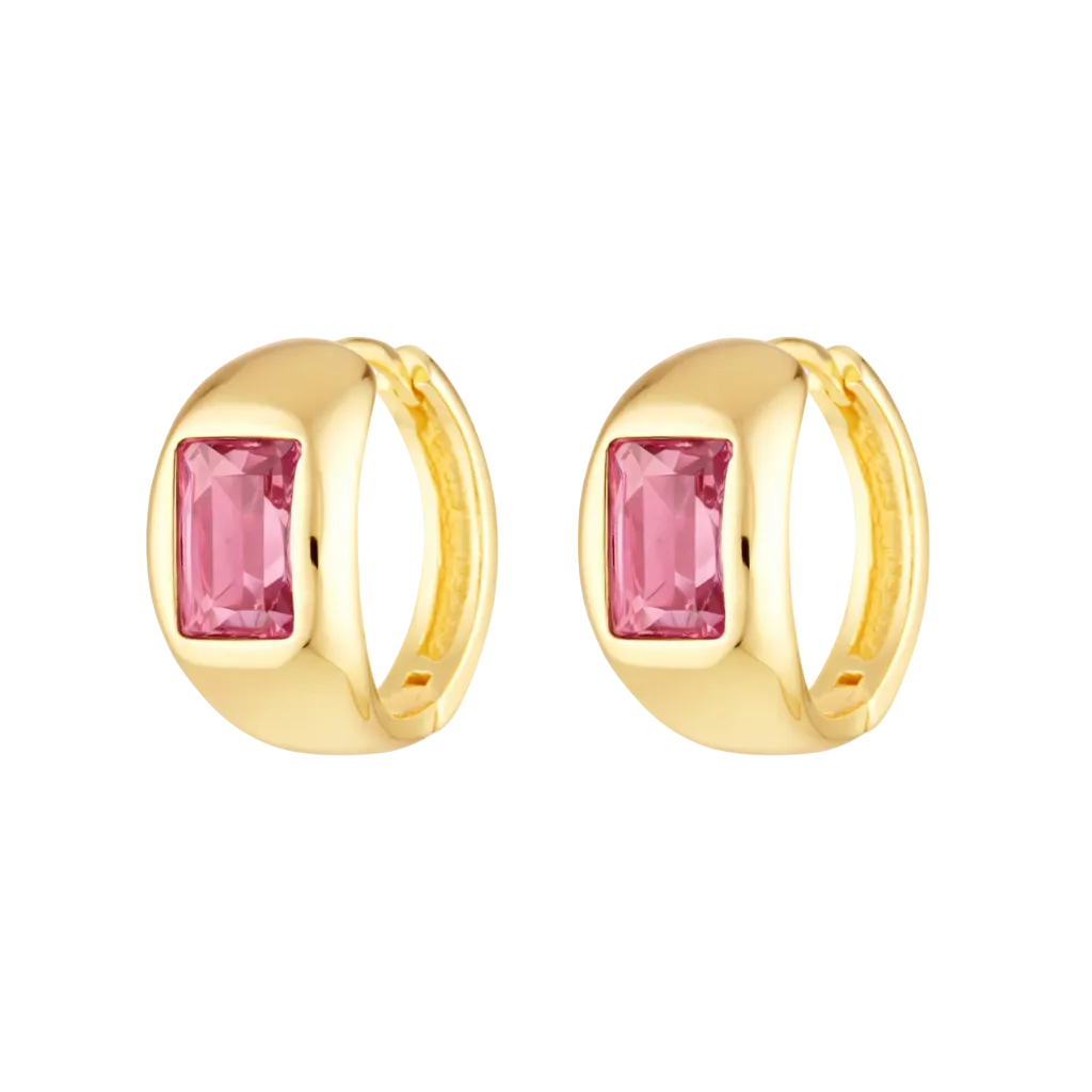 Gold hoop earrings with pink gemstones on a white background