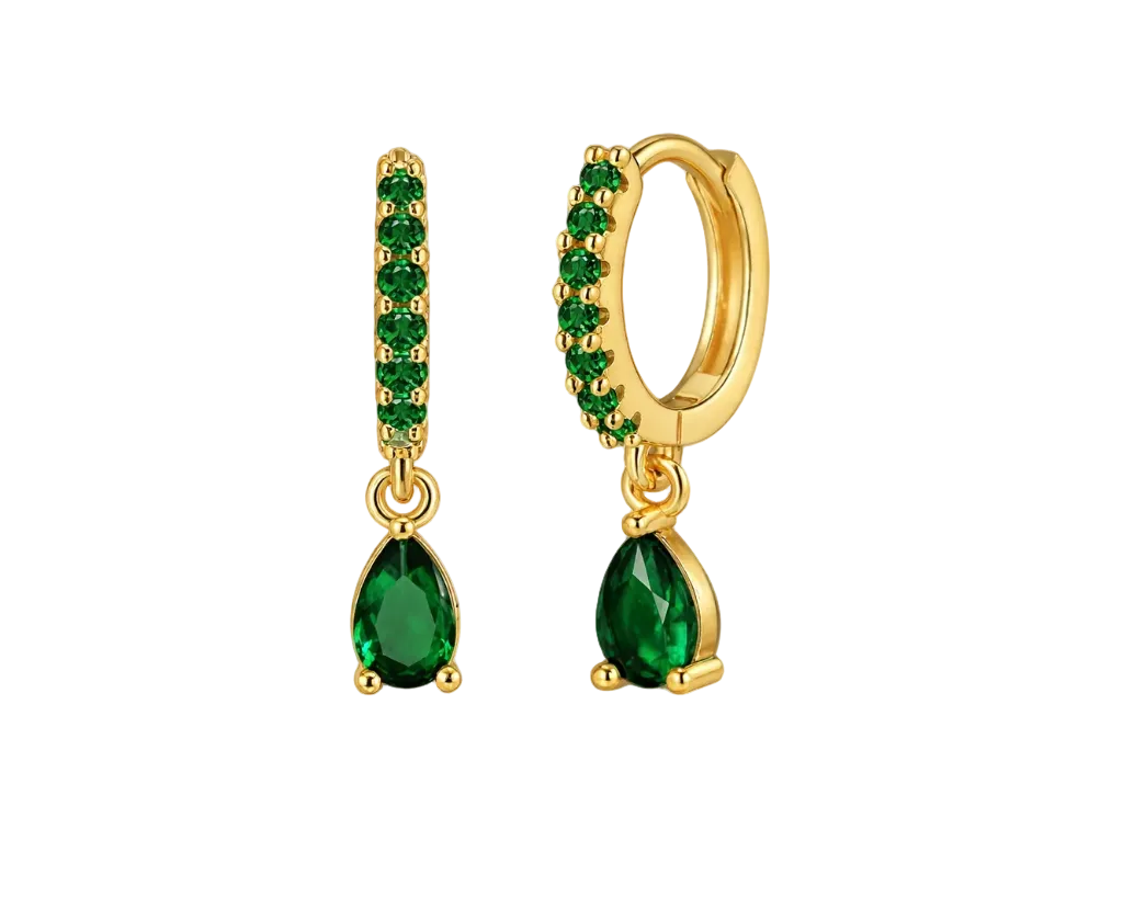 Gold hoop earrings with green gemstones on a white background