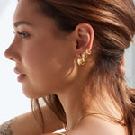 Model showing Bixby and Co earrings