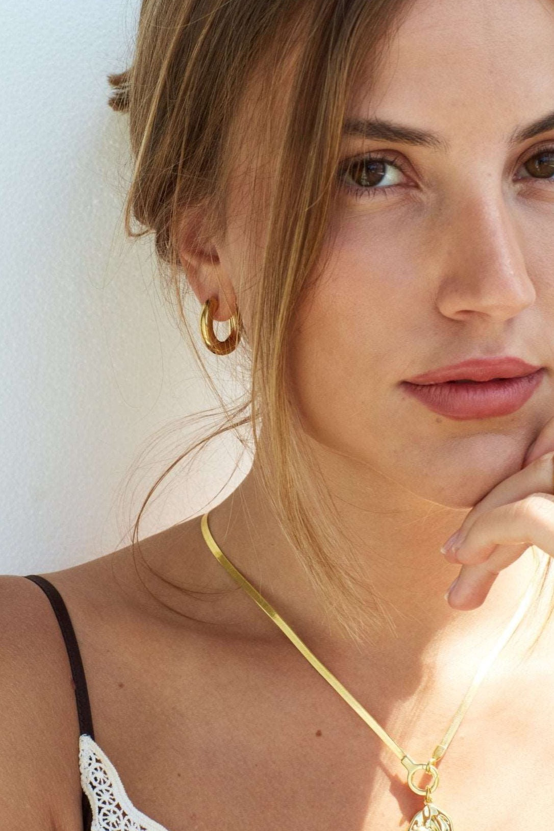 Solid everyday gold hoop earrings from Bixby and Co