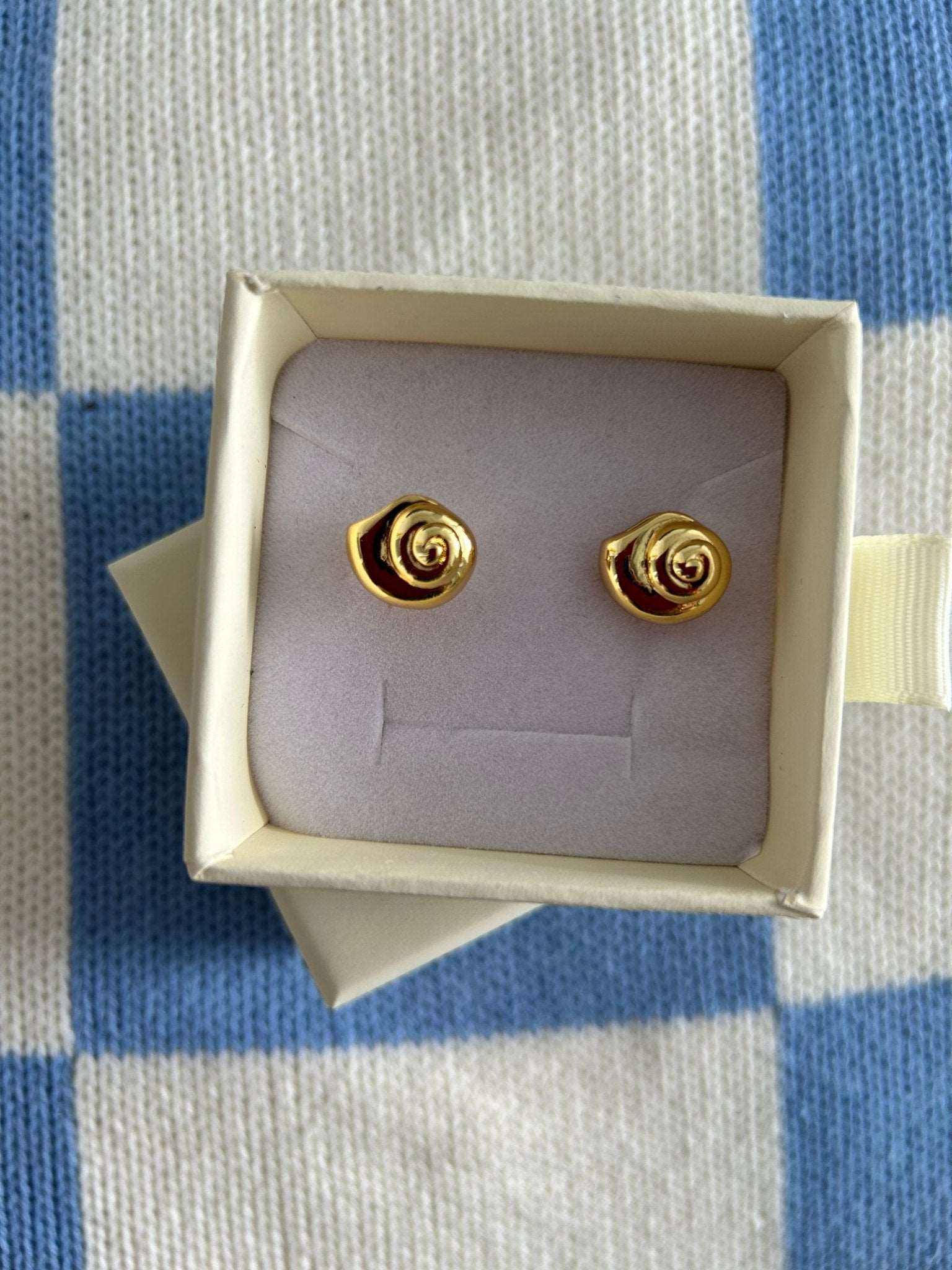 Gold Shell stud earrings in Bixby and Co jewellery box